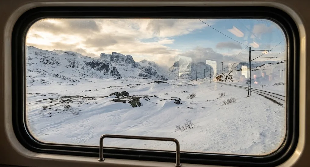 Snowy Hardangervidda plateau from train window