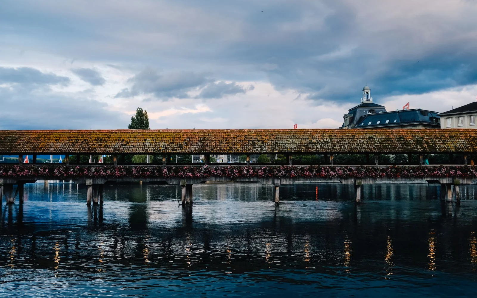Chapel Bridge and riverside buildings in Lucerne, the starting city of the worked example.