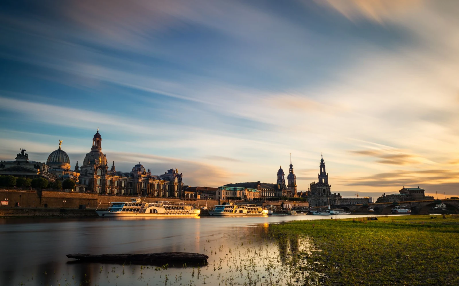 Dresden’s historic skyline reflected in the Elbe at dusk.