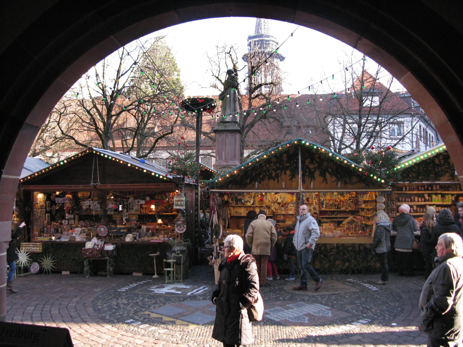 Christmas market stalls on Freiburg’s Rathausplatz, photographed in 2016.
