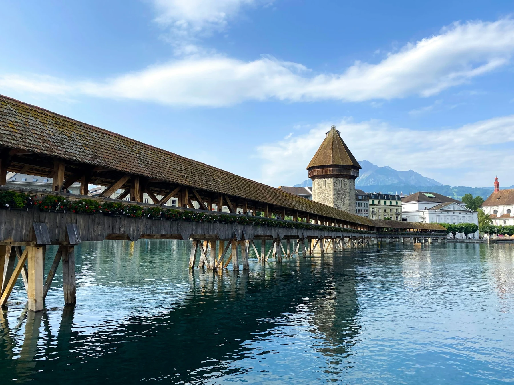 Chapel Bridge and the Water Tower beside the Reuss in Lucerne, Switzerland